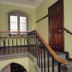 Interior.  Staircase leading to manager's room, view from landing to east