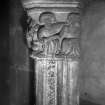 Interior-detail of chimneypiece-capital depicting "family life"