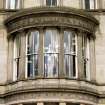 View of carved decoration on first floor bow window of 127-128 Princes Street.