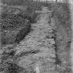 Excavation photograph. Probably rear wall of Principia