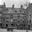 View of Westermore House, 10 Broad Street, Stirling, (David Brock, Glasgow Wine Vaults) from south, showing horse and cart and canon.