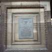 View of James Lind Memorial Plaque, on architectural panel at side of carriage entrance to Medical School.