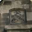 View of coat of arms in gable.