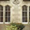 View of carving of 'Education', above ground floor windows of former school, No.3 Dean Path.