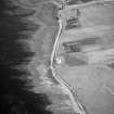 Hoy, Crockness, oblique aerial view, taken from the NNW, centred on the Martello Tower. A curving linear soilmark is visible in the centre right of the photograph.