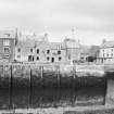 General view of Whale Hotel and Quay wall, Eyemouth from E.