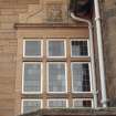 View of carved panel on facade of Scott House, 11 Kinnear Road.