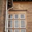 View of carved panel on facade of Jeffrey House, 13 Kinnear Road.