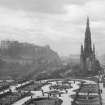 View from east showing Scott Monument, part of Princes Street, the Mound, Castle and Waverley Gardens