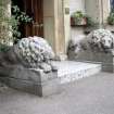 View of pair of lion sculptures, flanking entrance.