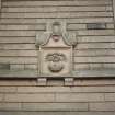 View of panel carved with Edinburgh arms, above doors of 13 and 14 St Leonard's Bank.