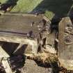 View of toppled gravestones in churchyard at Falkland.
