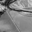 Oblique aerial view of Drumlanrig, taken from the SSW, centred on linear cropmarks, and the cropmarks of a Roman Temporary Camp and a pit-alignment.