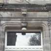 View of carved capitals, either side of main entrance.