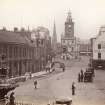 Historic photograph showing general view from south of Dumfries High Street including Midsteeple.