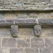 Detail of two corbels on south wall of chancel