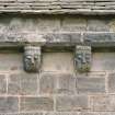 Detail of two corbels on south wall of chancel