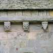 Detail of three corbels on north wall of chancel