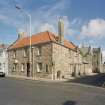 All Saints Episcopal Church.  View of corner block, North Street/North Castle Street and castle from South East.