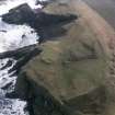 Oblique aerial photograph of St Abb's Head, Kirk Hill with the site of monastery of Coldingham.