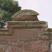 Detail of pediment above niche.