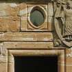 Detail of date-stone (1604) on south west wall of summerhouse.