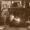 Tibbie Shiels Inn. Detail of Tibbie's fireplace and spinning wheel. Postcard