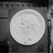 Roundel of Robert Burns medallion in situ in the artist's studio.