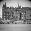 View from south of 112 - 117 Princes Street showing the Palace Hotel, and cars.