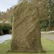 Pictish cross slab in manse garden, view of east (back) face (daylight)