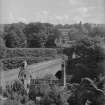 Currie, Old Change House
View of roofless cottage from North with view of Currie Kirk and bridge beyond.		