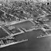 Dundee, general view, showing King William IV Dock and Tidal Harbour.  Oblique aerial photograph taken facing north. 