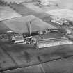 Dundee Floorcloth and Linoleum Co. Ltd. Linoleum Factory, Lochee, Dundee.  Oblique aerial photograph taken facing north. 