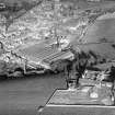Kirriemuir, general view, showing Gairie Works, Bellies Brae.  Oblique aerial photograph taken facing north-east.