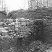 Jedburgh Abbey excavation archive 
Room 8. Wall 1080. Masons' marks X49, X50.