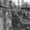Jedburgh Abbey excavation archive 
Room D: Wall 428. Mason's mark X101.