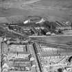 Dumbarton, general view, showing Dalreoch Station and Hardie and Cordon Levenbank Foundry.  Oblique aerial photograph taken facing north.