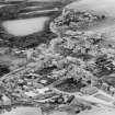 Banff, general view, showing St Mary's Church and Burial Ground and Duff House Gardens.  Oblique aerial photograph taken facing south-west.