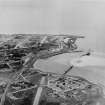 Lossiemouth, general view, showing Old Harbour and Spey Bay.  Oblique aerial photograph taken facing north.  