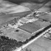 William Teacher and Sons Ltd. Ardmore Distillery, Kennethmont, Huntly.  Oblique aerial photograph taken facing north.
