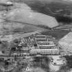 Arrol-Aster Car Factory, Heathhall, Dumfries.  Oblique aerial photograph taken facing east.  This image has been produced from a damaged negative.