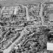 Penicuik, general view, showing High Street, John Street and Woodslea.   Oblique aerial photograph taken facing north.