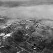 Grangemouth Docks, general view, showing the Eastern Channel.  Oblique aerial photograph taken facing north.  The image is double exposed.