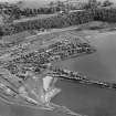 John Denholm and Co. Timber Yard and Sawmill, Corbiehall, Bo'ness.  Oblique aerial photograph taken facing south-east.