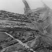 John Denholm and Co. Timber Yard and Sawmill, Corbiehall, Bo'ness.  Oblique aerial photograph taken facing west.