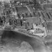 Glasgow, general view, showing Strathclyde Public School and Barrowfield Works.  Oblique aerial photograph taken facing north.  This image has been produced from a damaged negative.