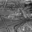 Chancelot Roller Flour Mills, Dalmeny Road, Leith, Edinburgh.  Oblique aerial photograph taken facing north.  This image has been produced from a damaged negative.