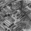 John Inglis and Son Oatmeal Mill and other works, Newhaven Road, Bonnington, Edinburgh.  Oblique aerial photograph taken facing west.  This image has been produced from a damaged negative.
