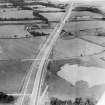 The A8 Glasgow and Edinburgh Road, Carnbroe, Coatbridge.  Oblique aerial photograph taken facing west.