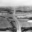 The A8 Glasgow and Edinburgh Road, Carnbroe, Coatbridge.  Oblique aerial photograph taken facing west.